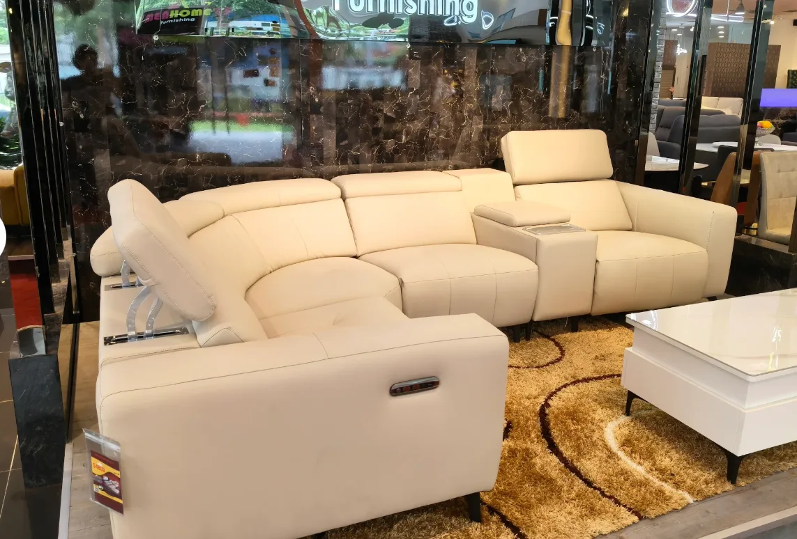 Cream leather sectional sofa set up in the Megahome showroom