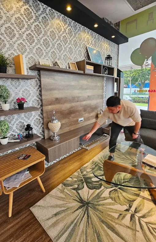 Megahome team installing a modular TV feature wall for a customer