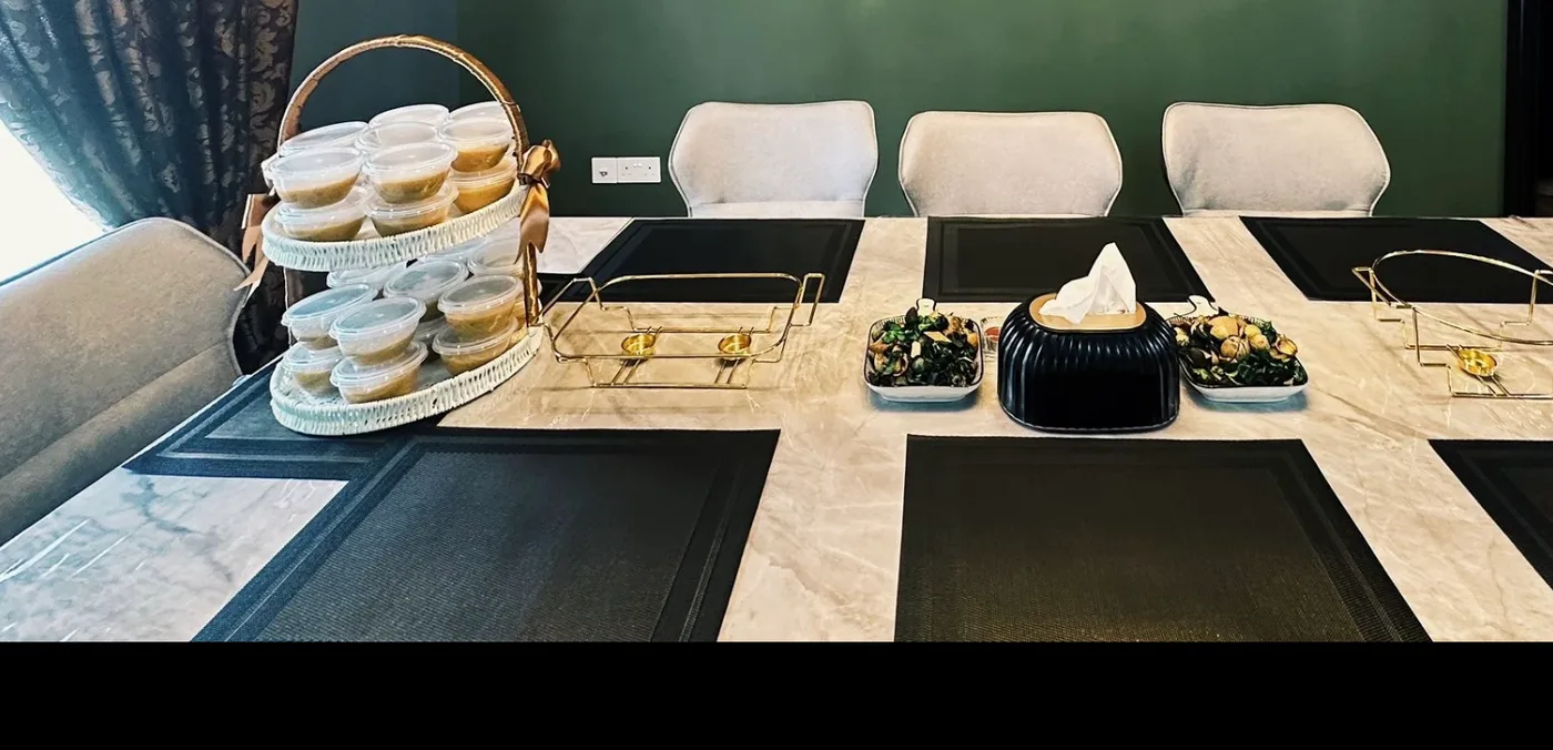 Family dining table set for a meal, furnished by Megahome