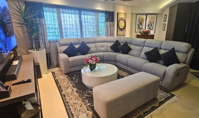 A customer's living room furnished with a Megahome sofa and matching decor